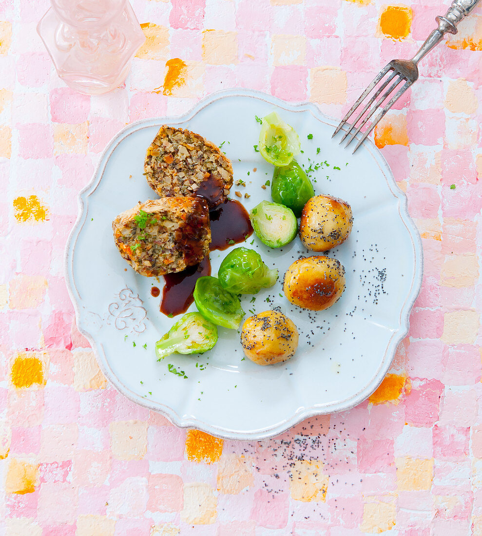Nut roast with brussels sprouts and poppy seed potato dumplings