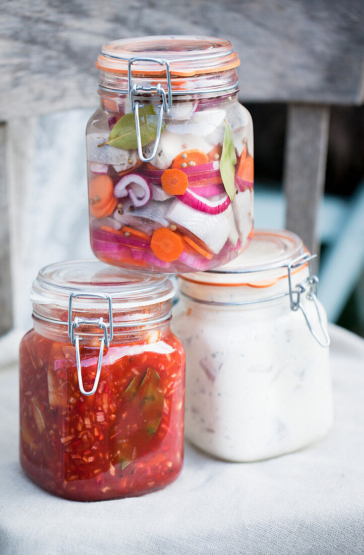 Pickled herring in glass jars
