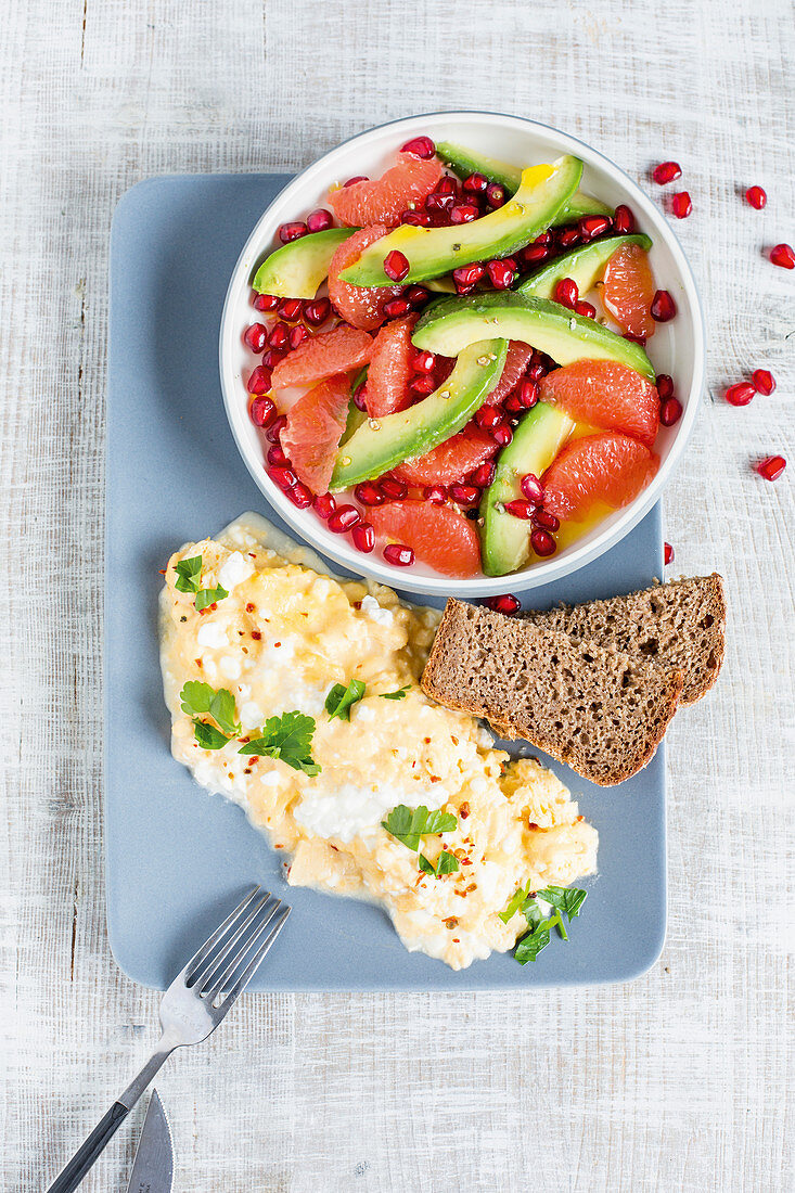 Cottage cheese scrambled eggs with a grapefruit and avocado salad