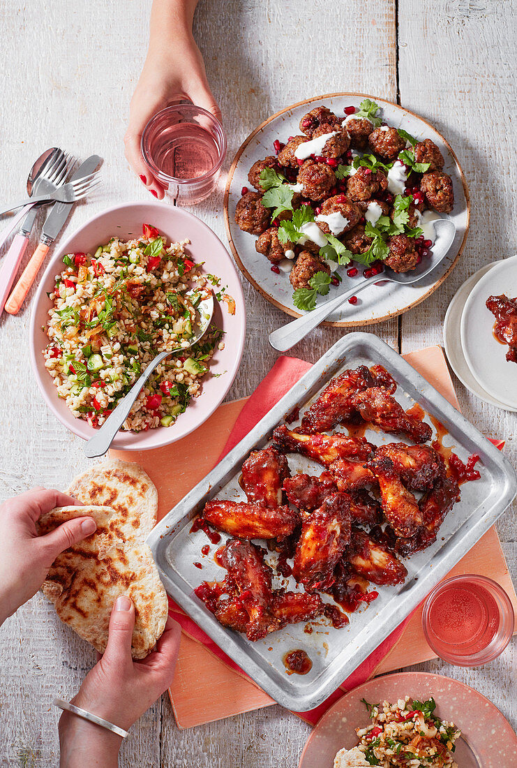 Barley and bulghar chopped herb salad, Lemony lamb meatballs, Chicken wings with chilli & date caramel