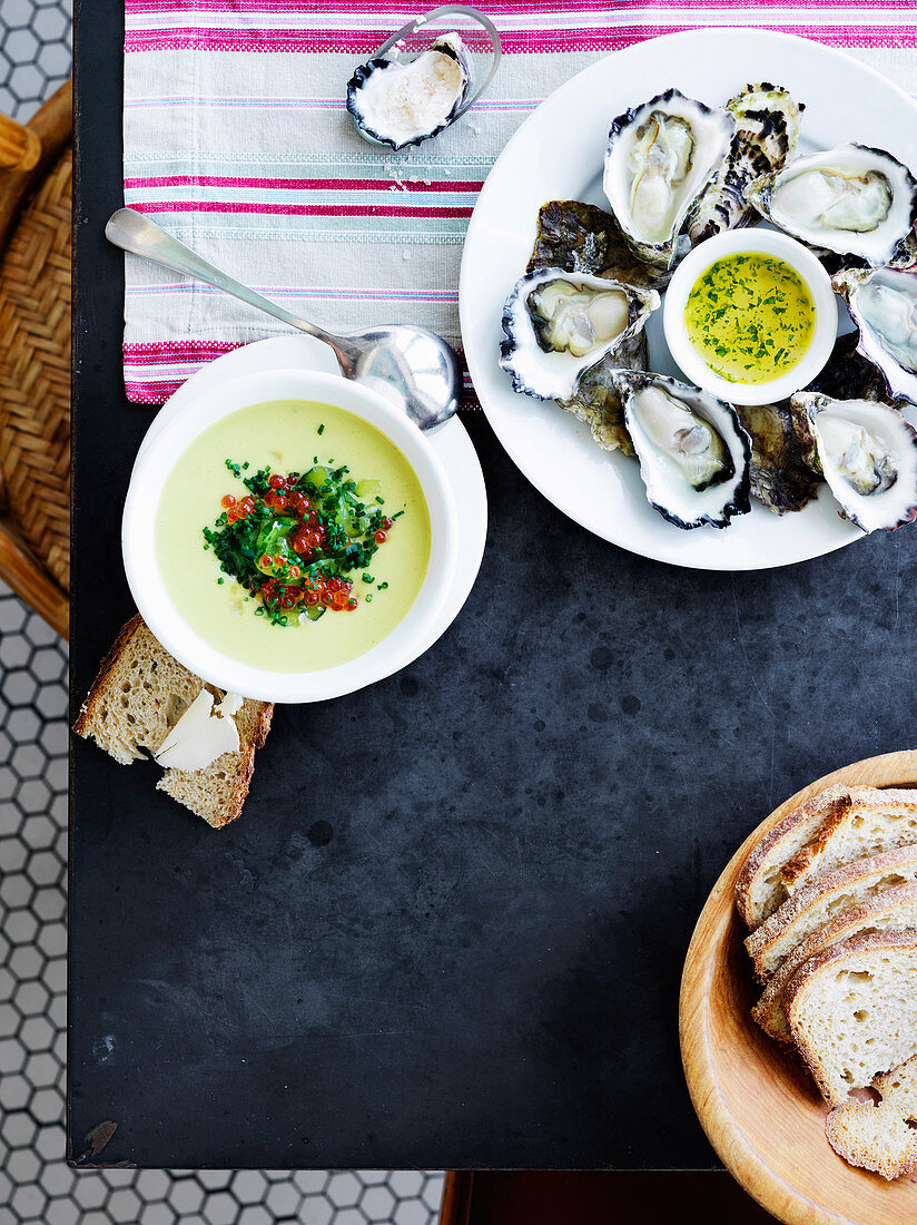 Freshly shucked oysters with tarragon dressing and cucumber soup