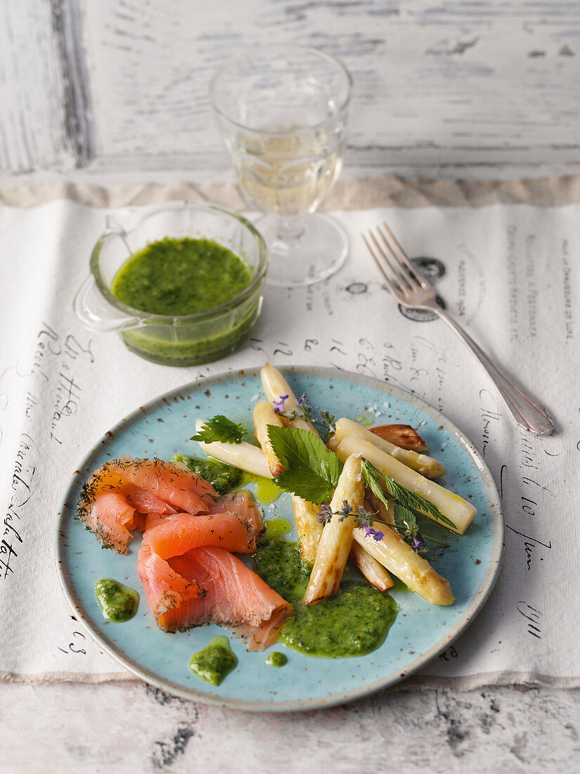 Marinated salmon trout with asparagus and wild herb pesto