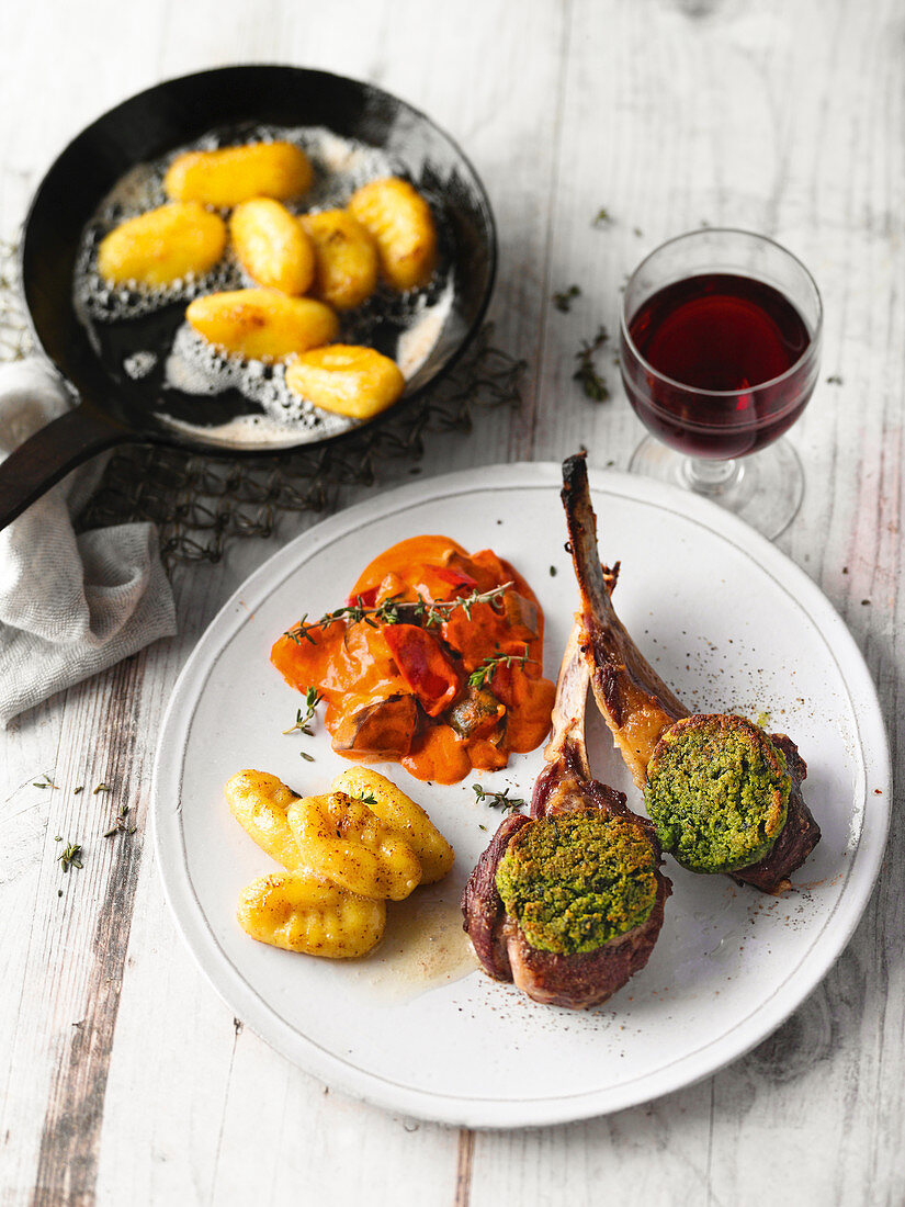 Lamb chops with a wild garlic crust on a bed of ratatouille