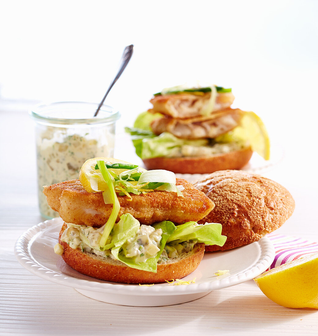 Fried fish breadcrumbs with cucumber remoulade and lemon