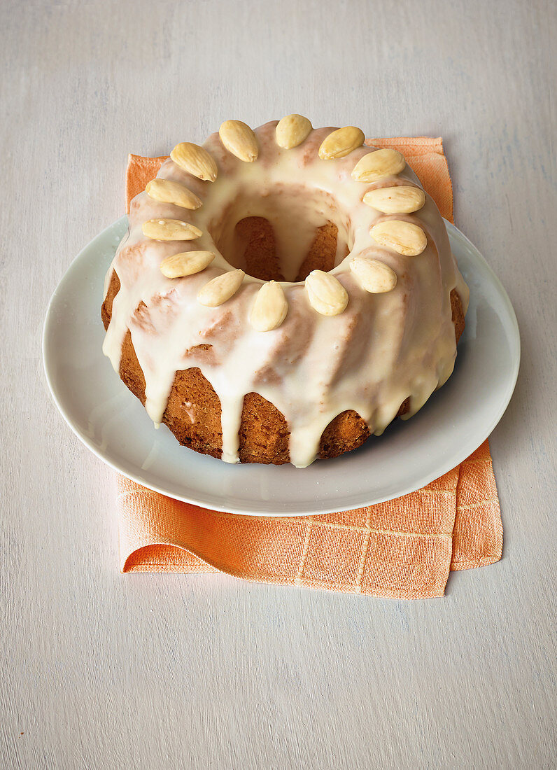 A mini orange cake with almonds