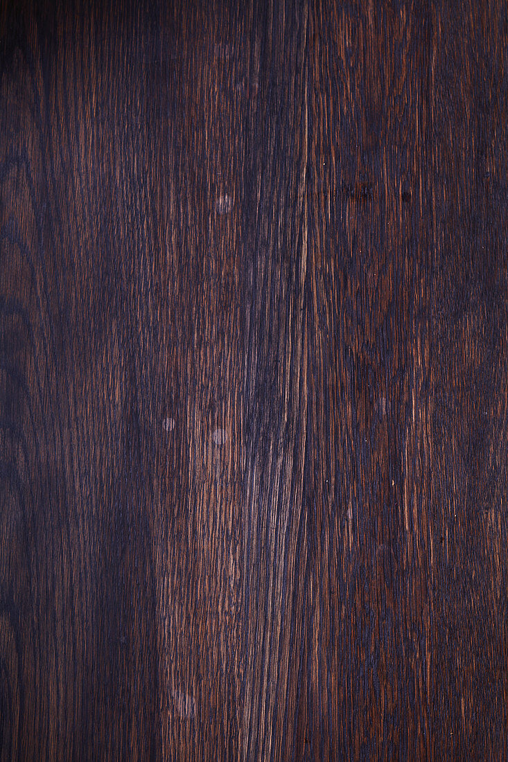 A dark wood background