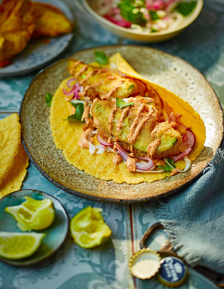 Baja avocado tacos with chipotle crema and pickled slaw