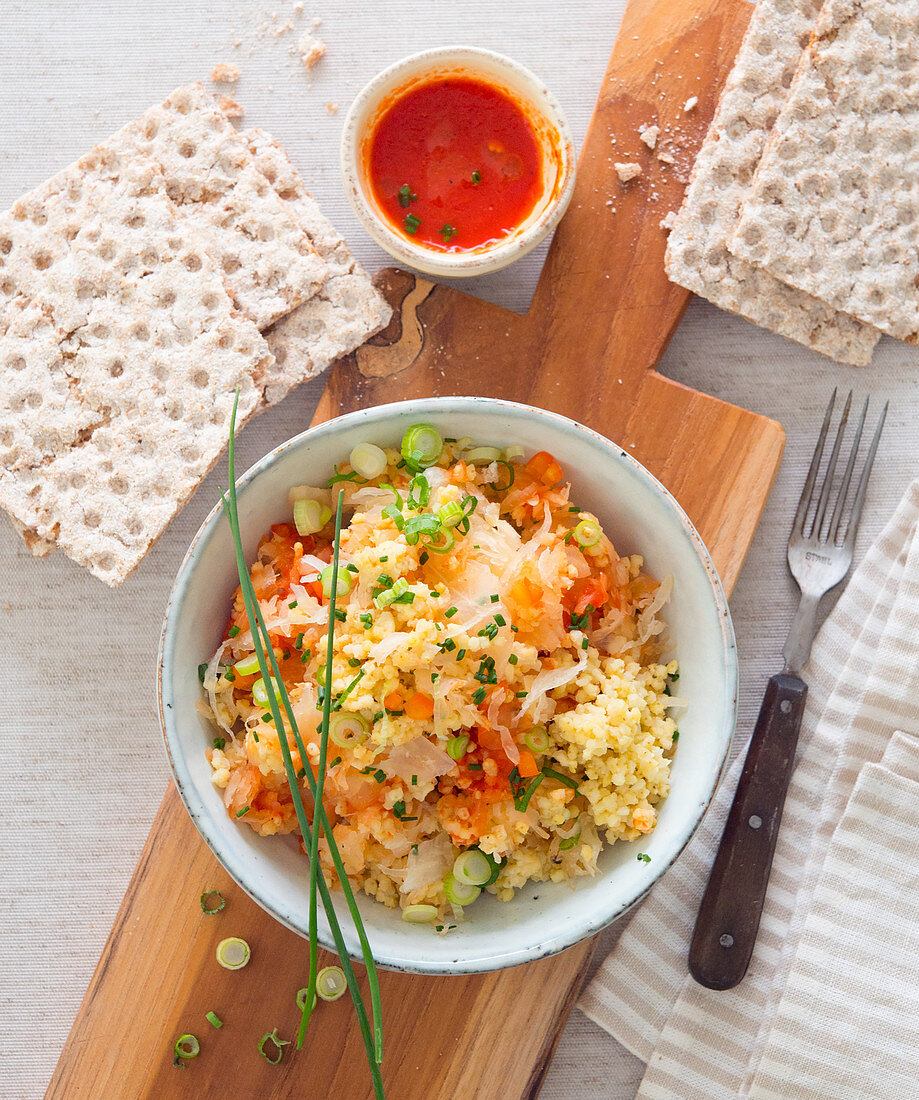 Millet salad with sauerkraut and tomatoes