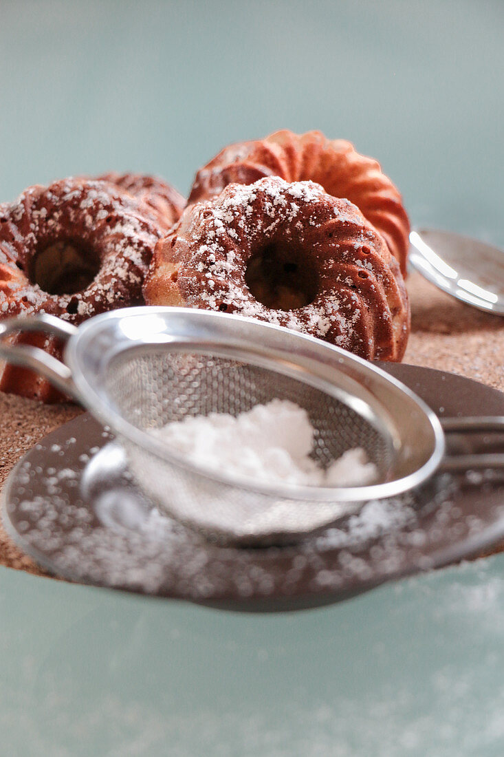 Mini marble Bundt cakes dusted with icing sugar