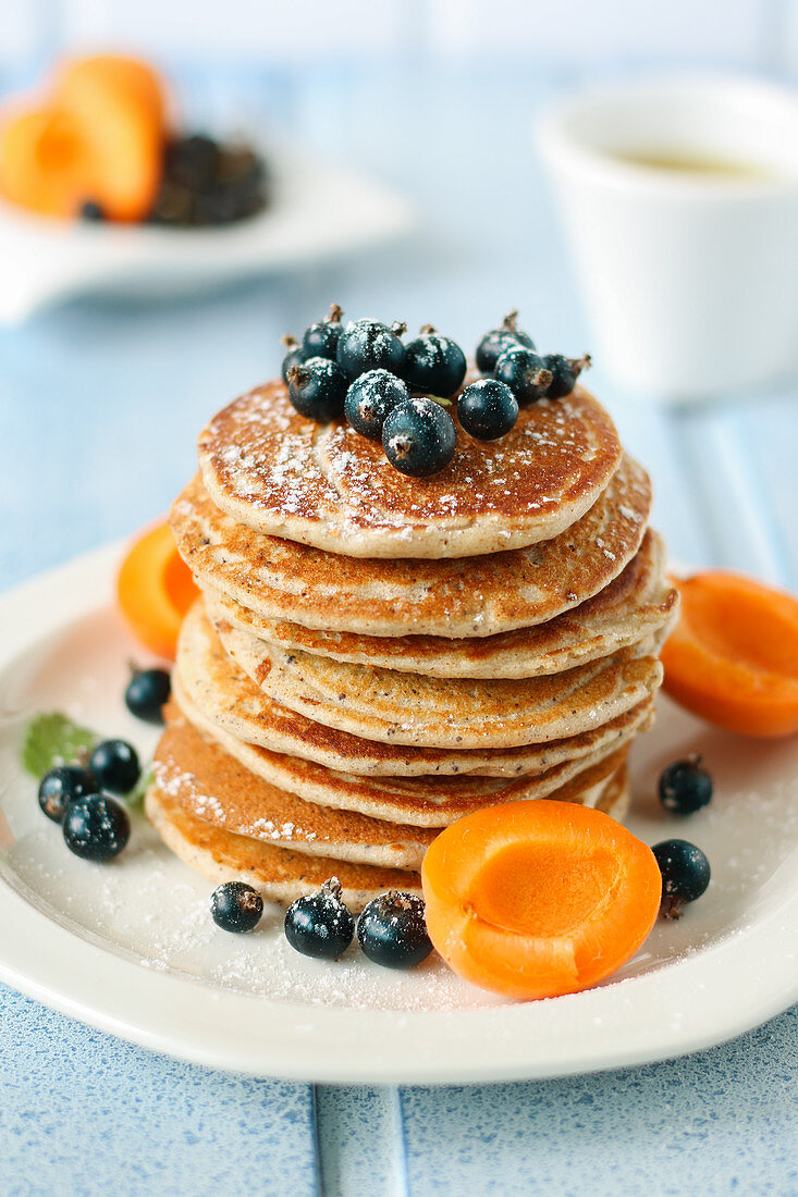 Poppyseed pancakes with apricots and berries