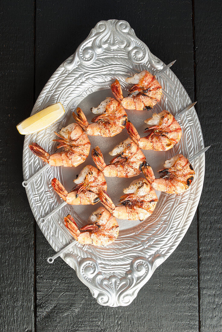 Skewered shrimp on platter
