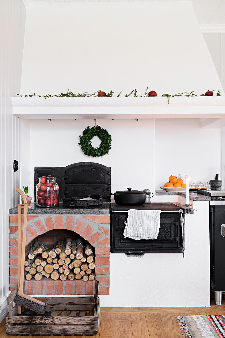 Antique wood-burning stove in country-house kitchen