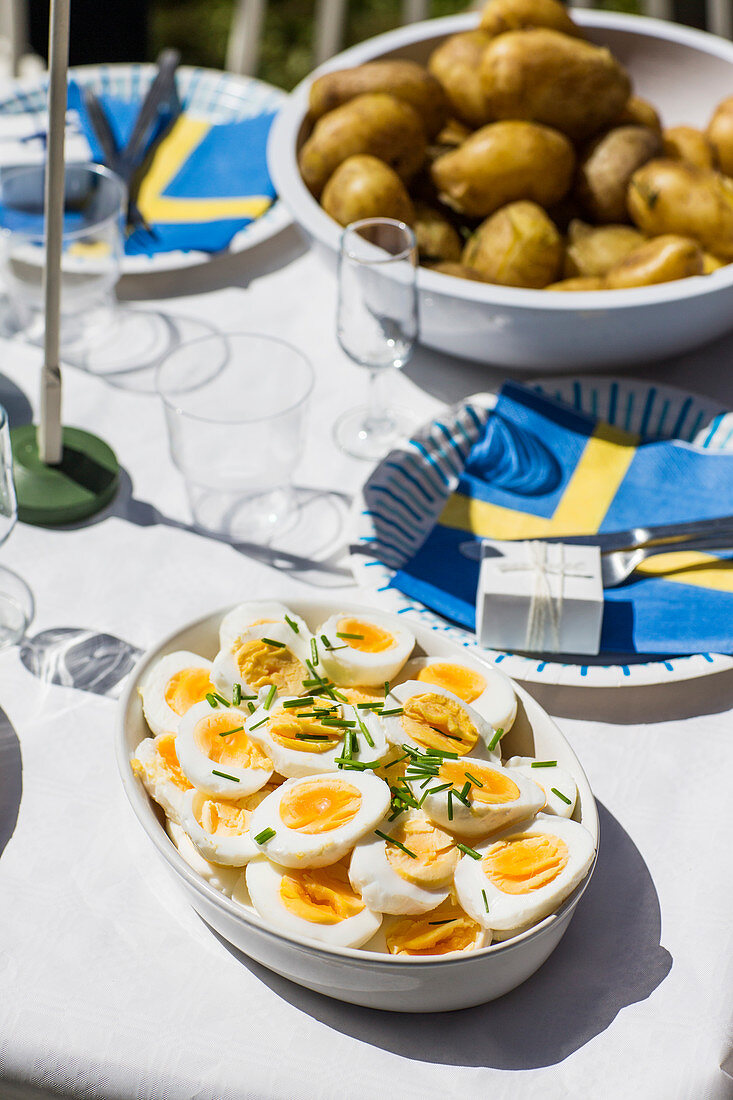 A Swedish buffet with hard-boiled eggs and potatoes