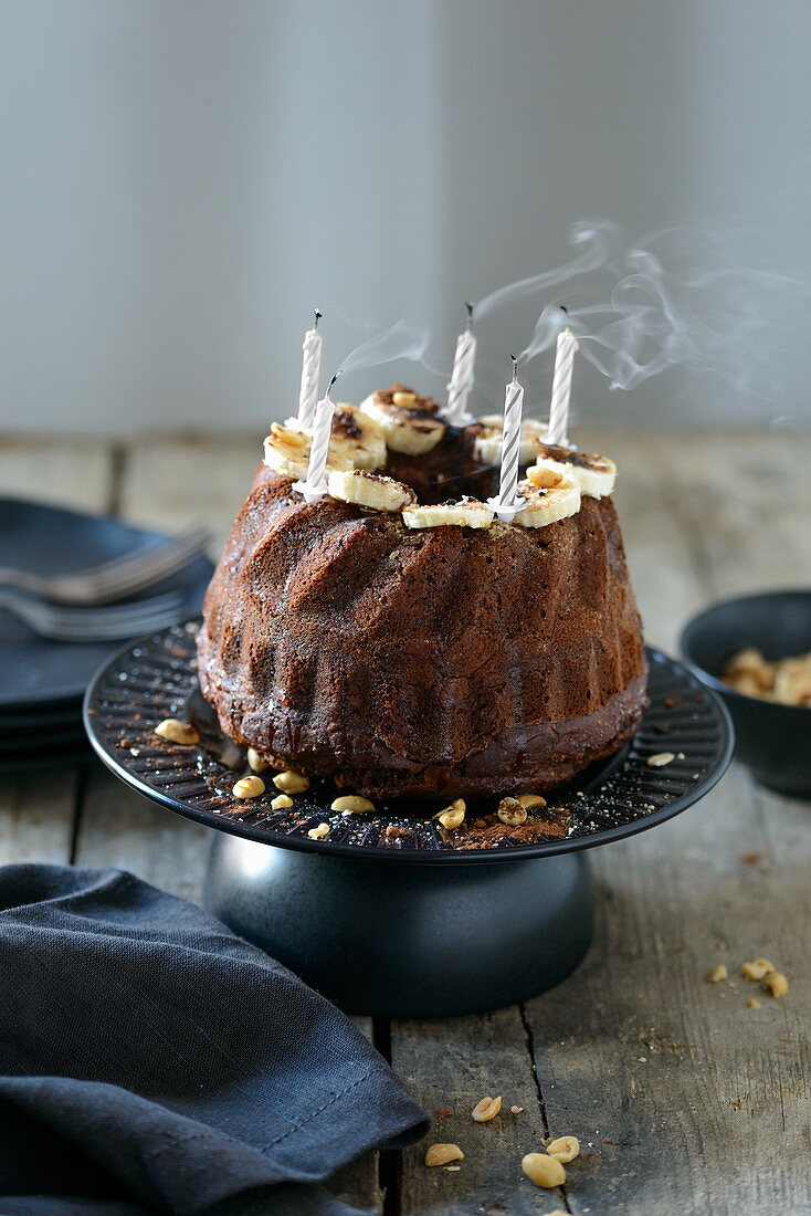 Banana cake with blown out candles