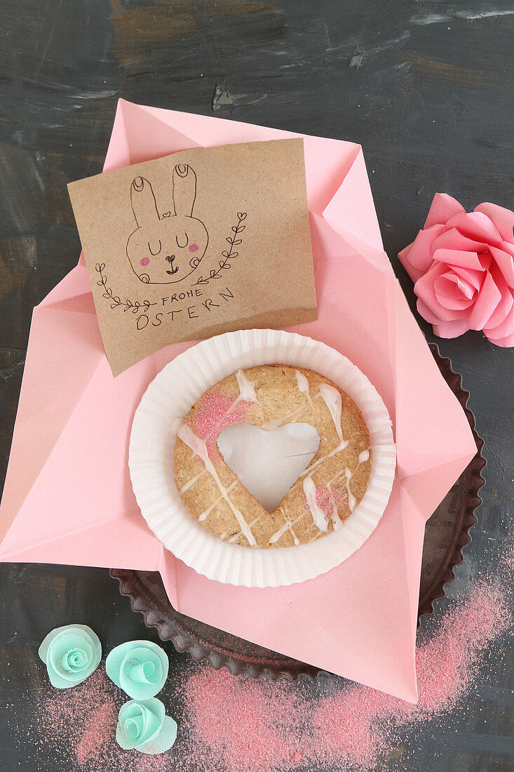Handmade Easter card and biscuit with heart-shaped cut-out