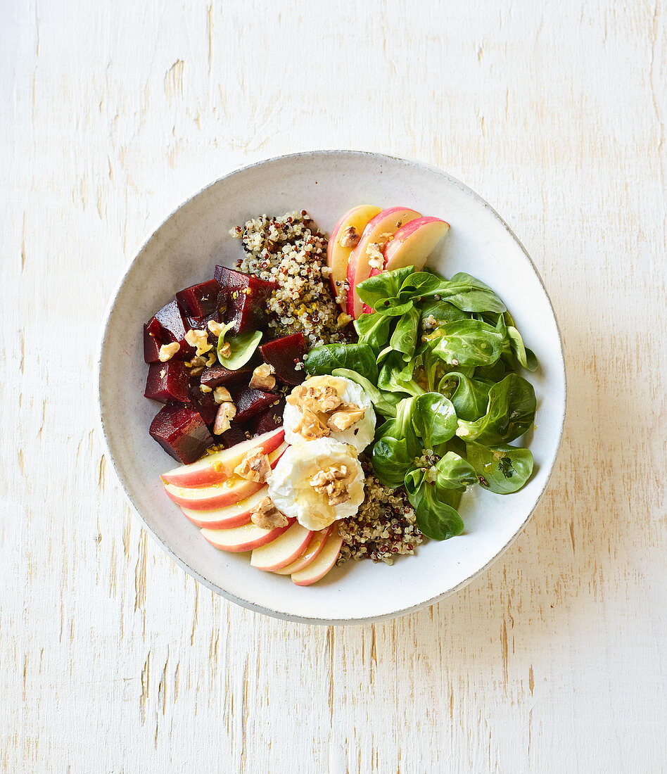 A salad bowl with quinoa and beetroot