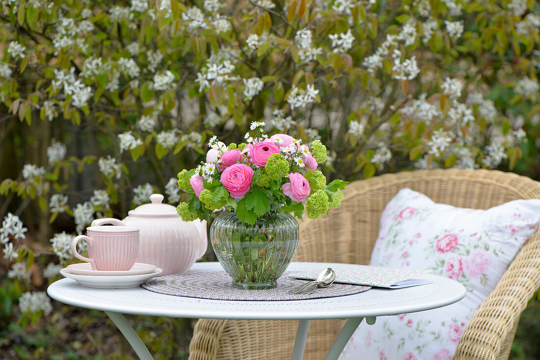 Spring bouquet with ranunculus and English lawn daisies