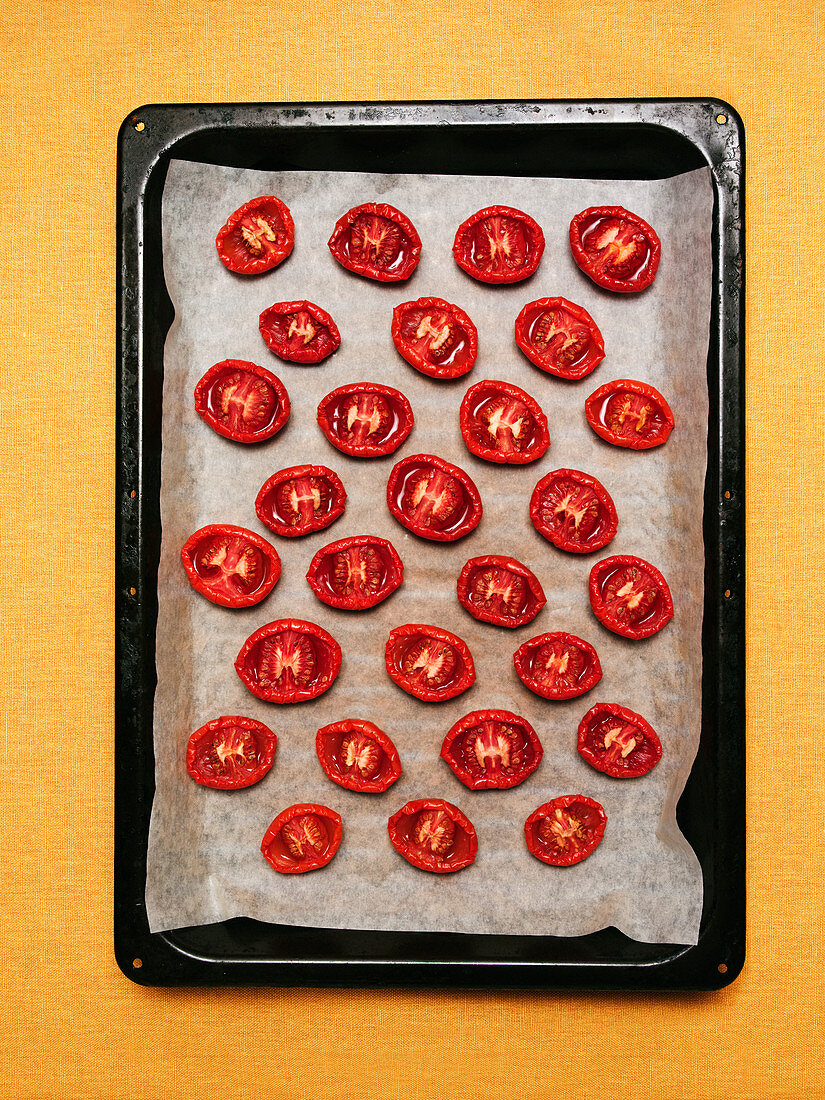 Baked tomatoes on baking tray