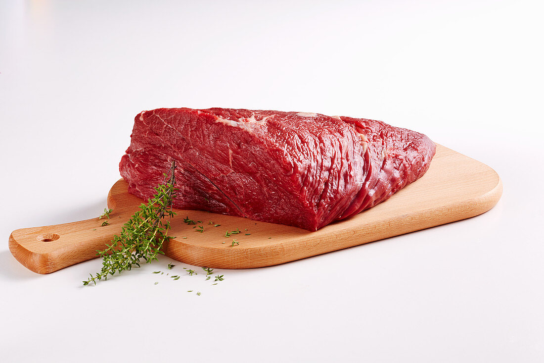 A thick bow of beef, raw