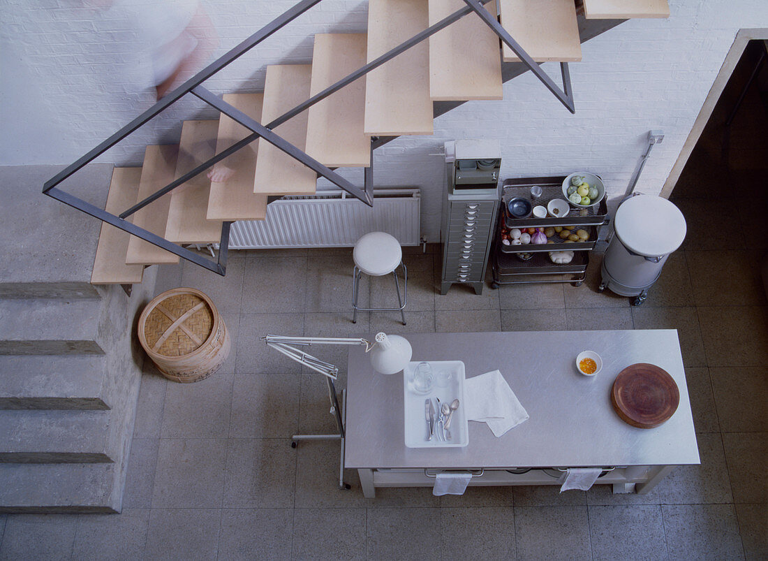 Minimalist, industrial-style kitchen seen from above