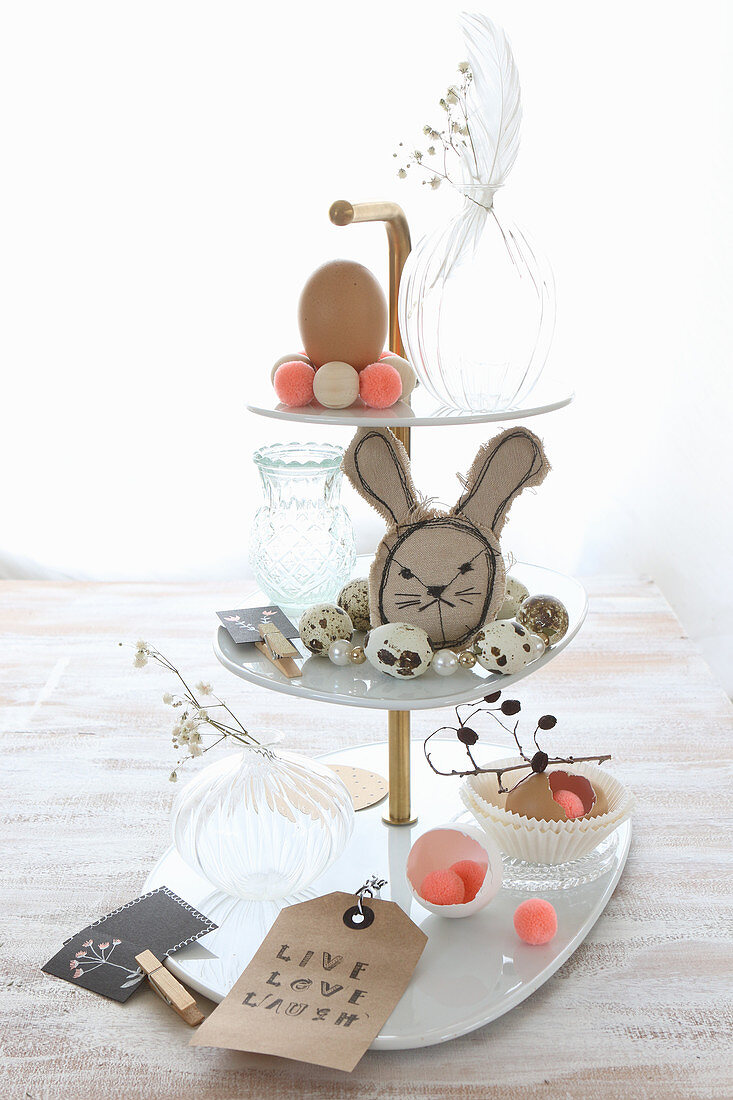 Easter arrangement on white cake stand