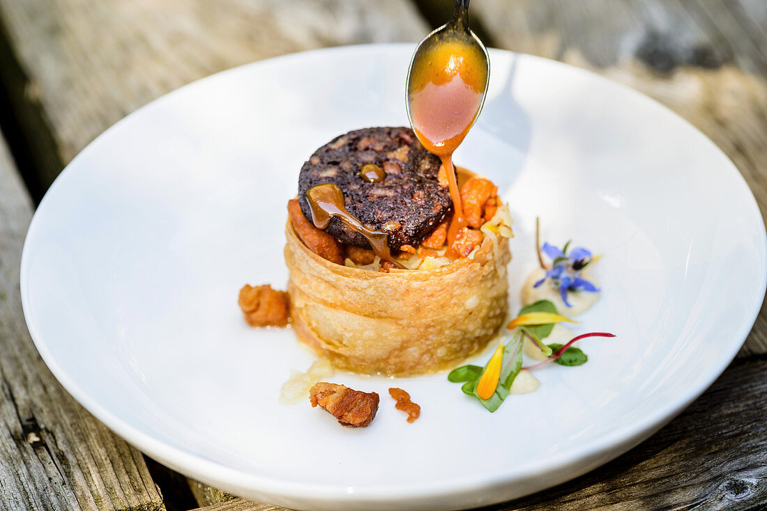 Herb strudel with black pudding