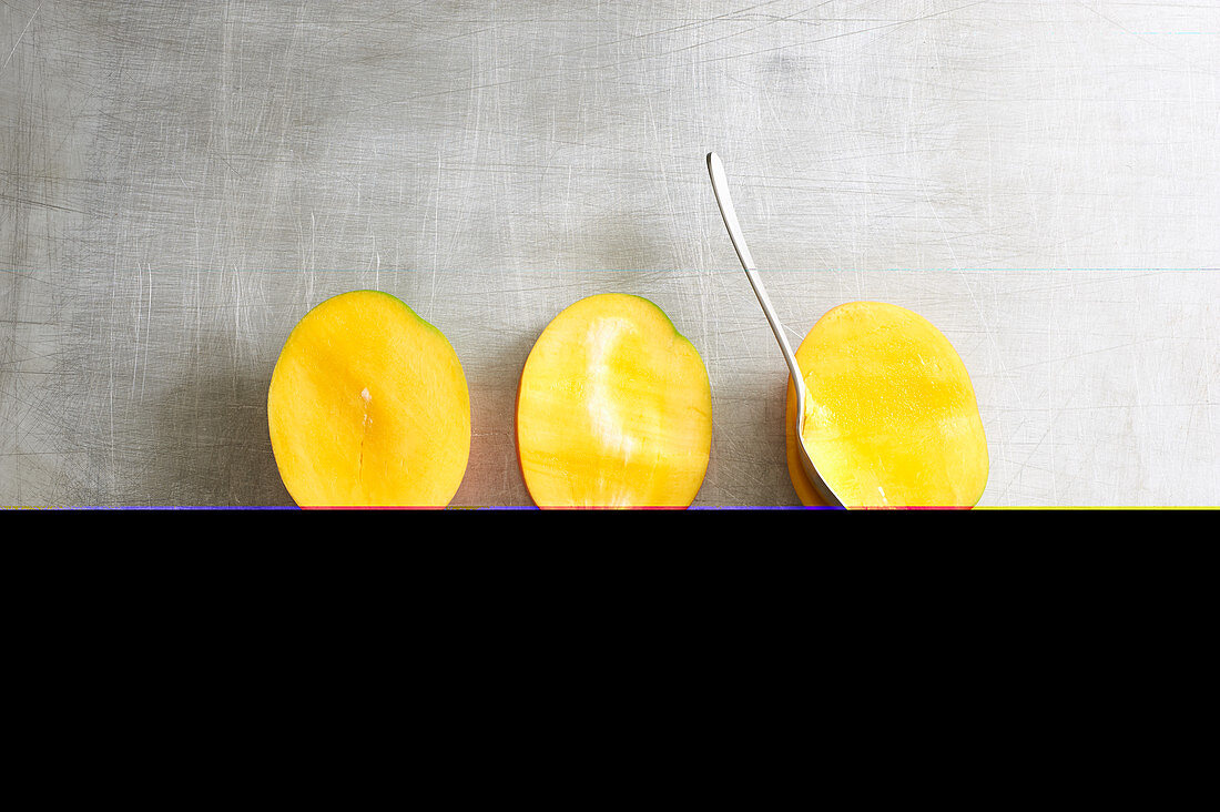 Mangos being peeled