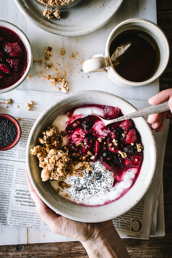 Delicious breakfast bowl with quinoa, rice and groats