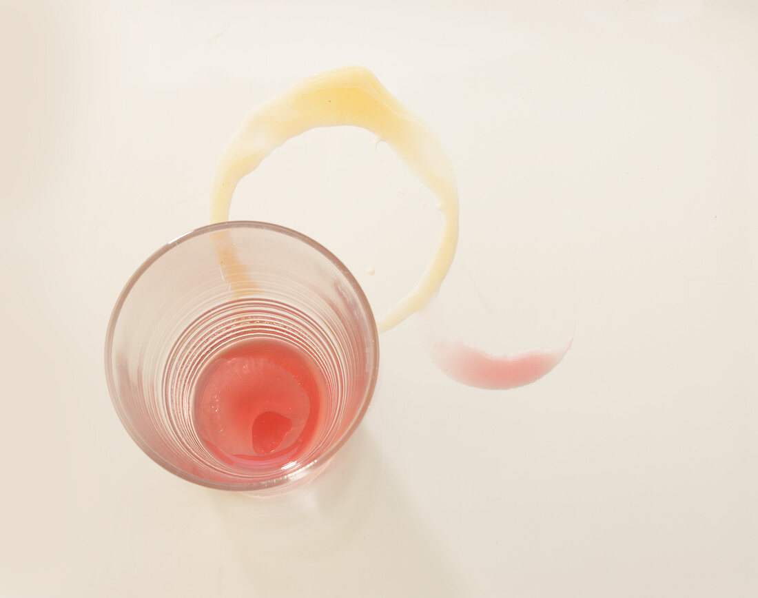 An empty juice glass