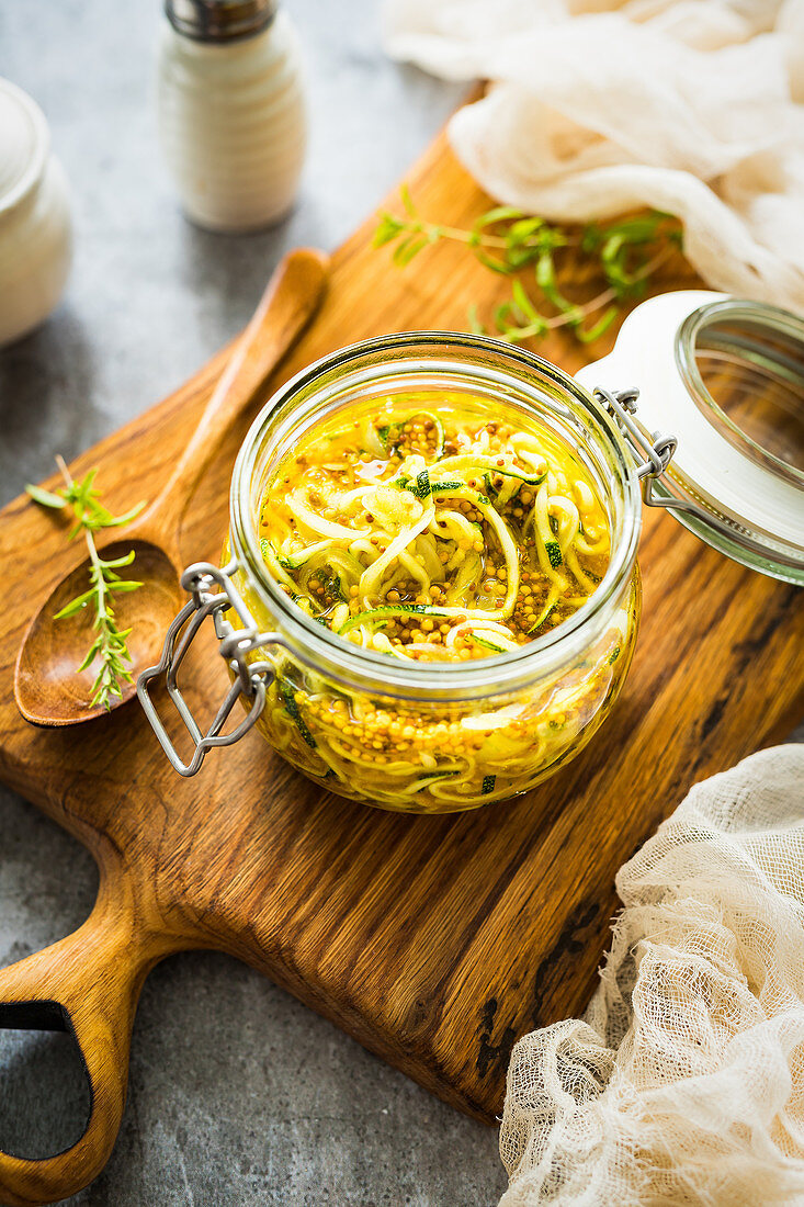 Zucchini with onions and mustard seeds in vinegar marinade