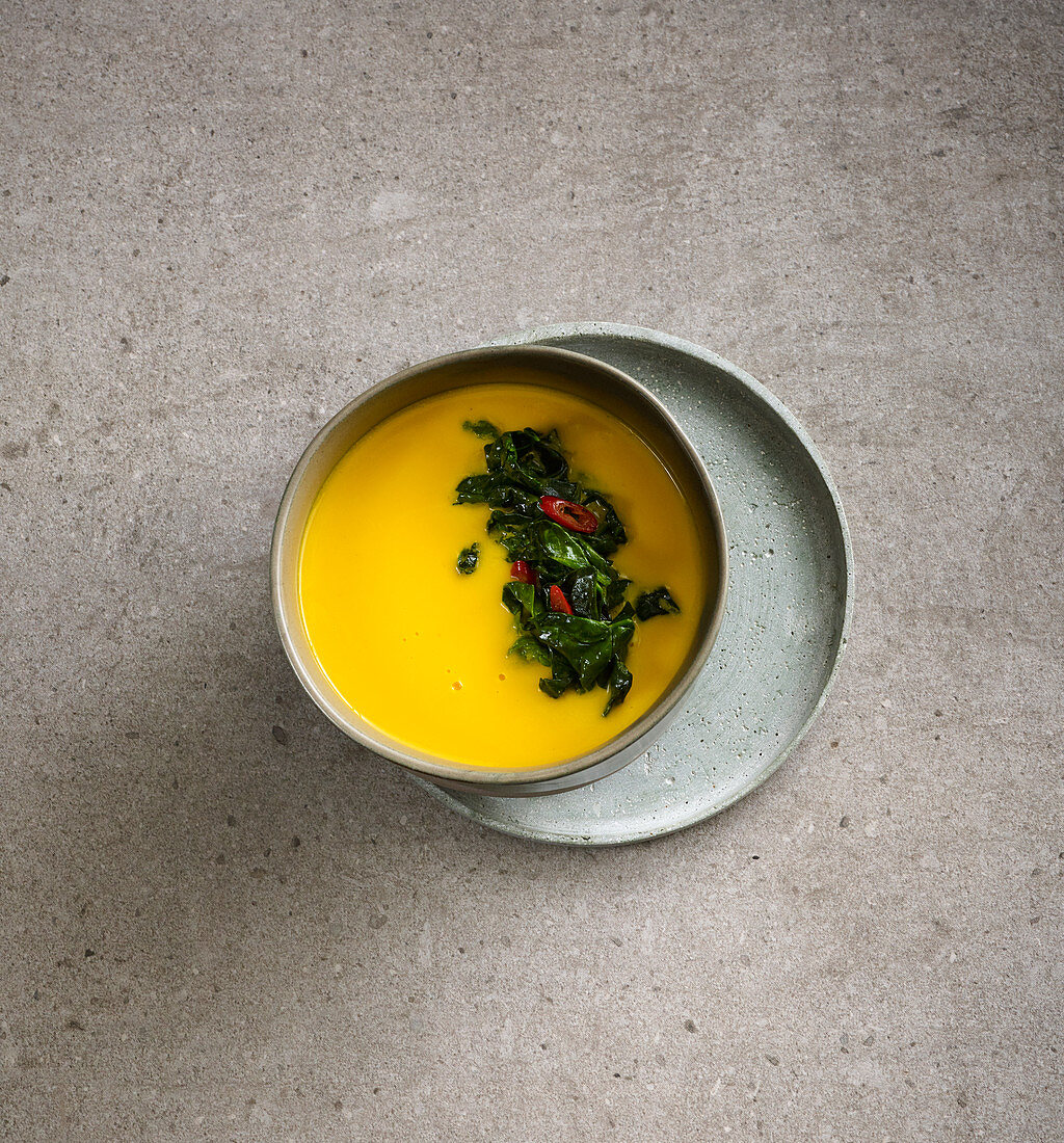 Pumpkin soup with chilli spinach