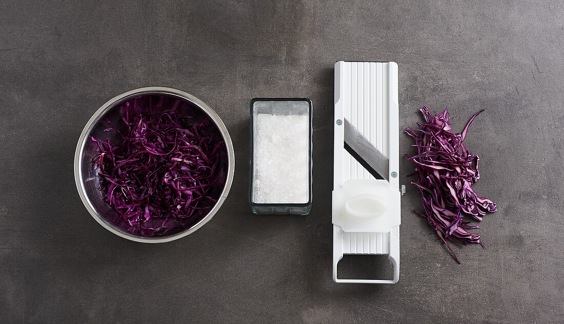 Red cabbage being grated