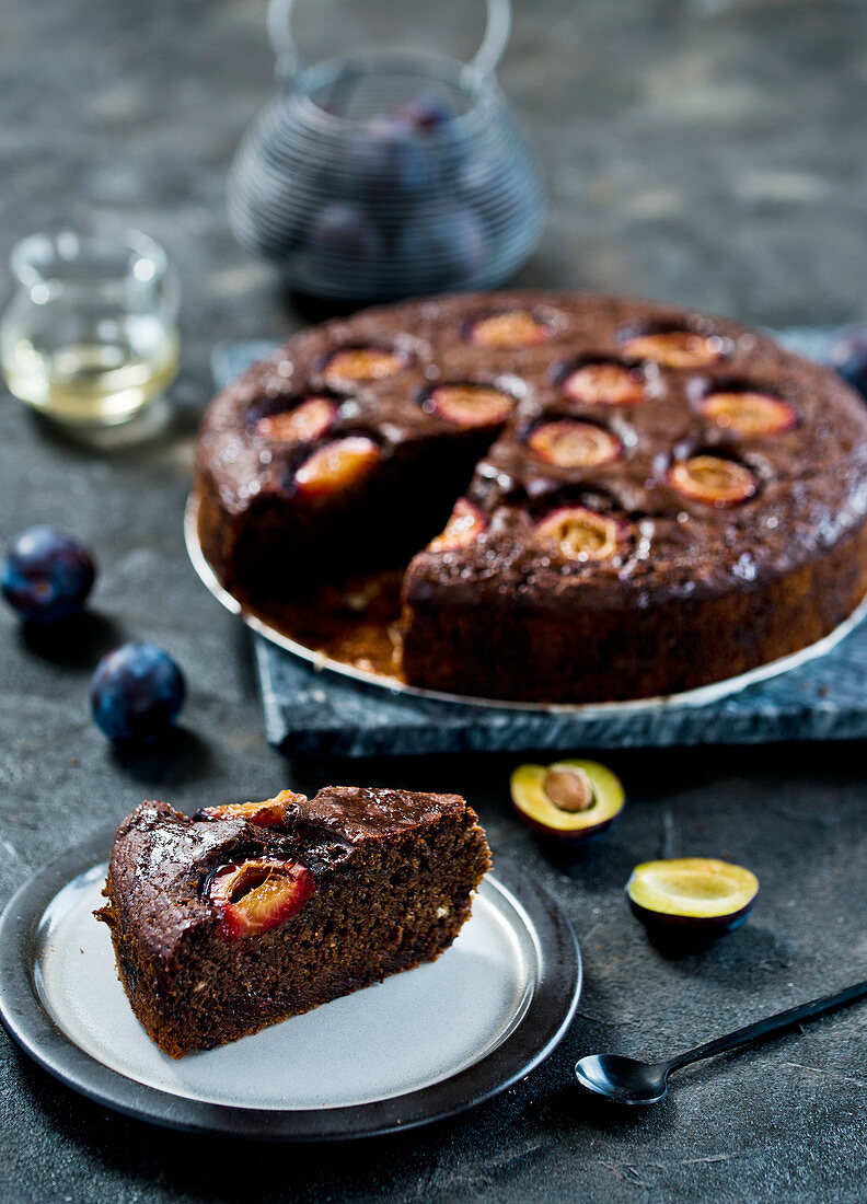 Chocolate zucchini cake with plums