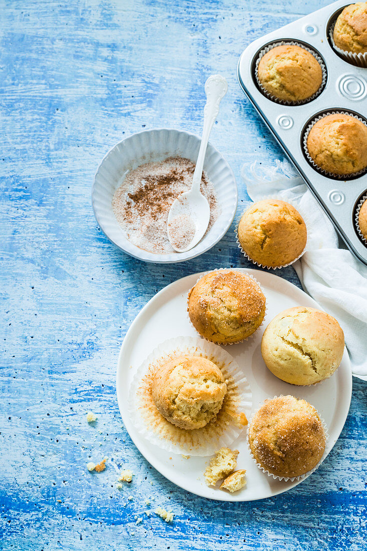 Muffins coated with cinnamon sugar