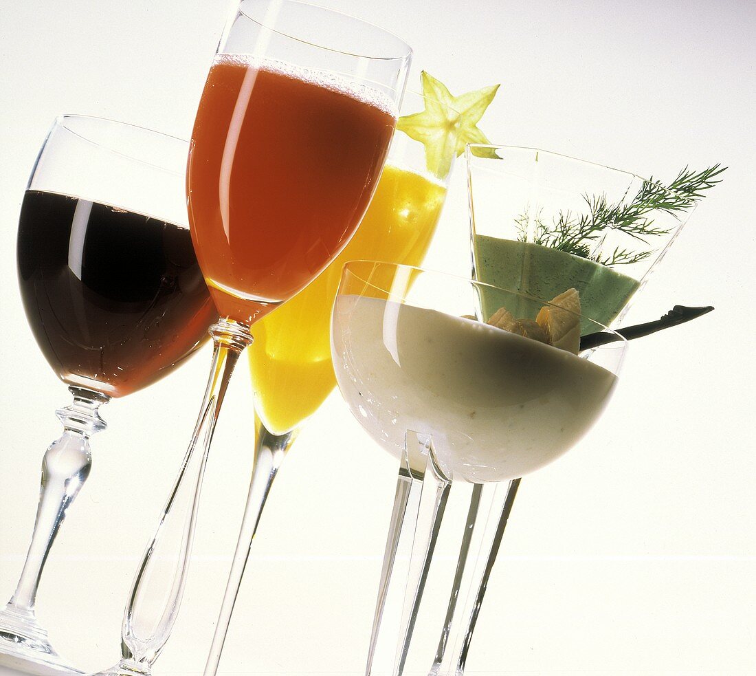 Assorted Vegetable and Fruit Juices in Stem Glasses
