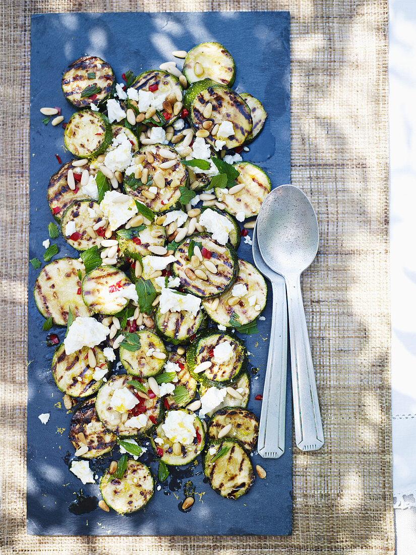 Griddled courgettes with pine nuts and feta