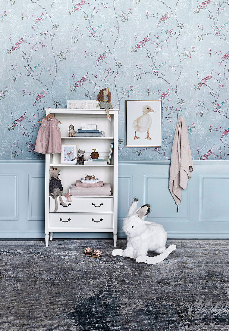 White shelves and a rocking hare in a nursery