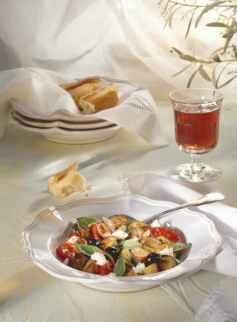 A Serving of Sauteed Vegetables; Bread; Red Wine