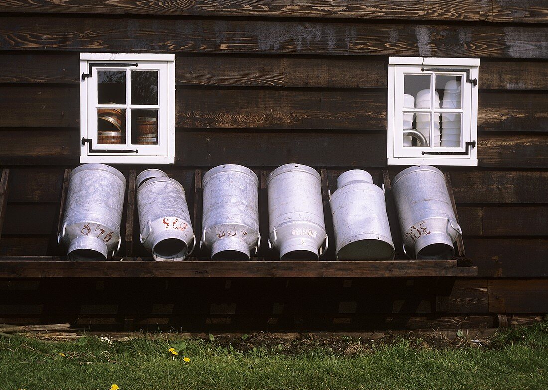 Milk cans in front of house (Zaanse Schans museum, Holland)