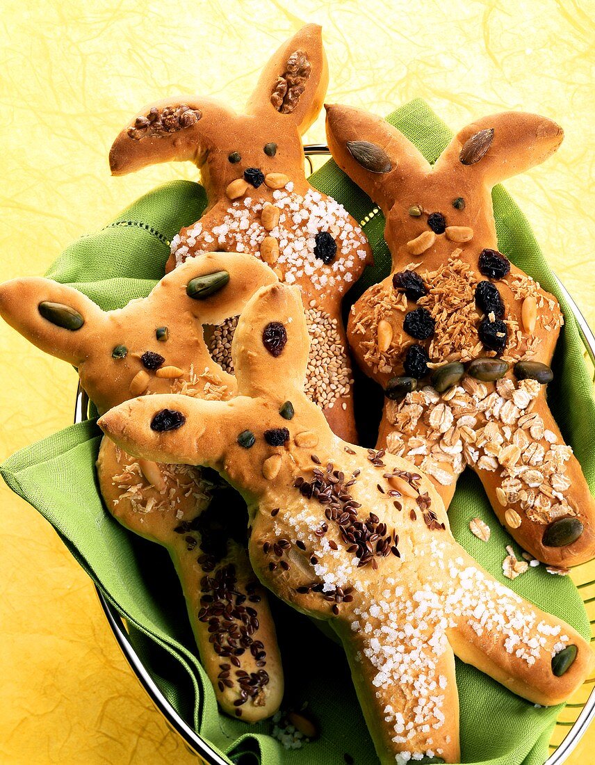 Bread Easter bunny decorated with grains, nuts, raisins etc