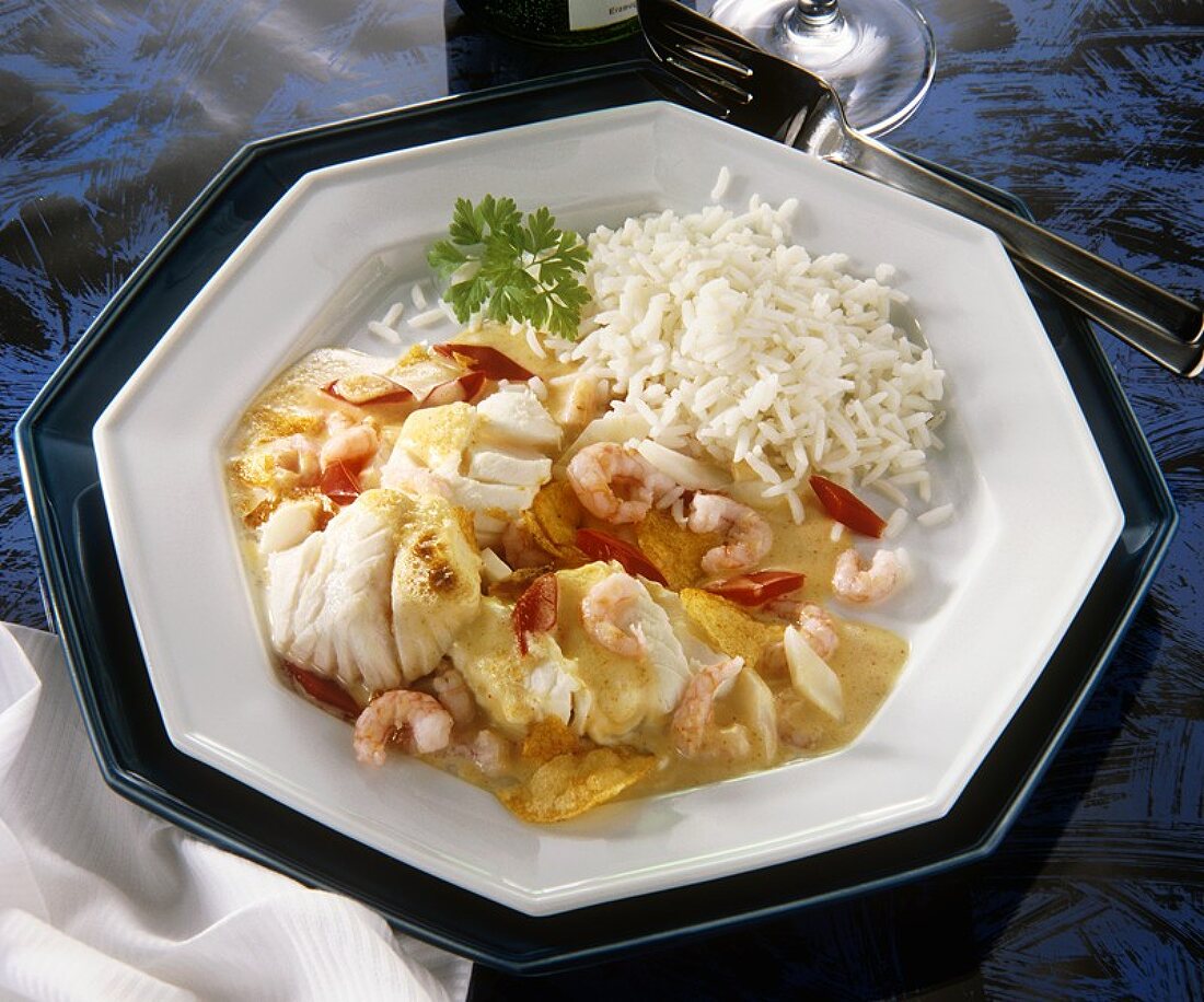 Cod & Northern shrimps in curry sauce with peppers & rice