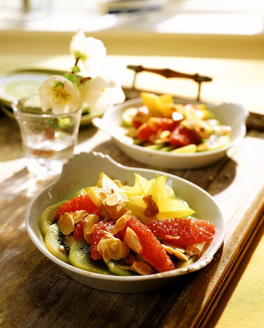 Exotic salad: grapefruit, carambola, kiwi & flaked almonds