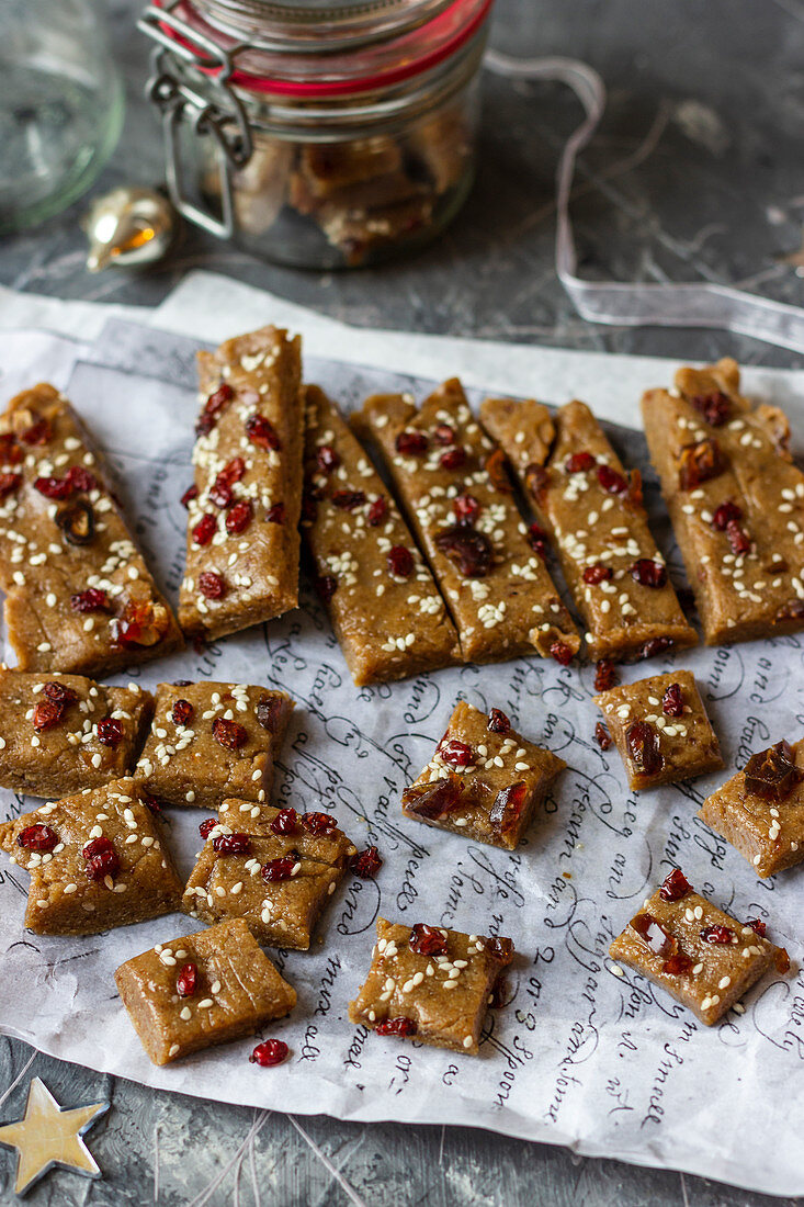 Tahini and dates homemade bars with sesame seeds and cranberry