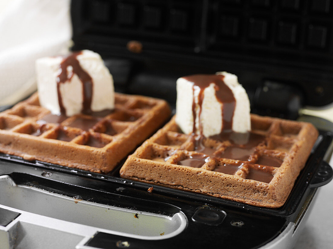 Waffles with marshmallows and chocolate sauce