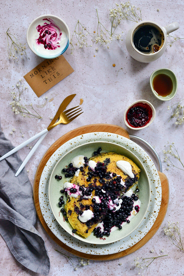 Omelette with blueberries on a plate breakfast