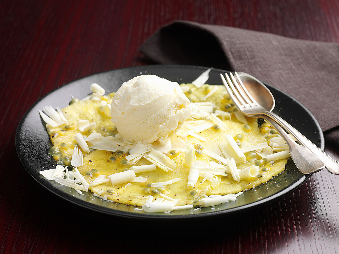 Pineapple carpaccio with white chocolate chips