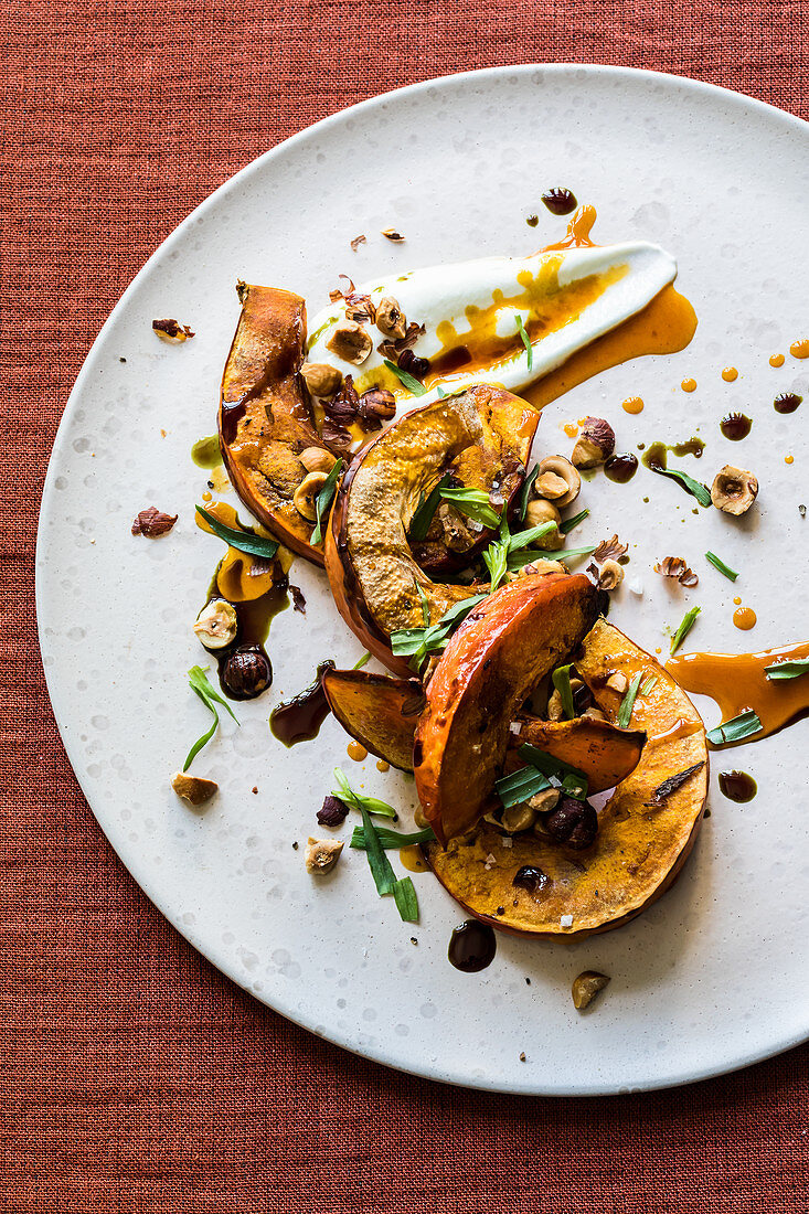 Oven-roasted pumpkin with hazelnuts, yoghurt and sea buckthorn