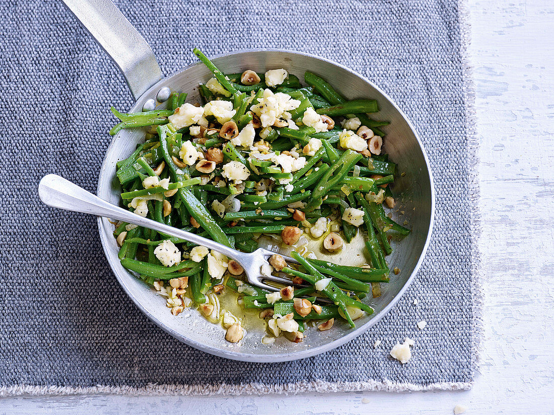 Green beans with feta and hazelnuts