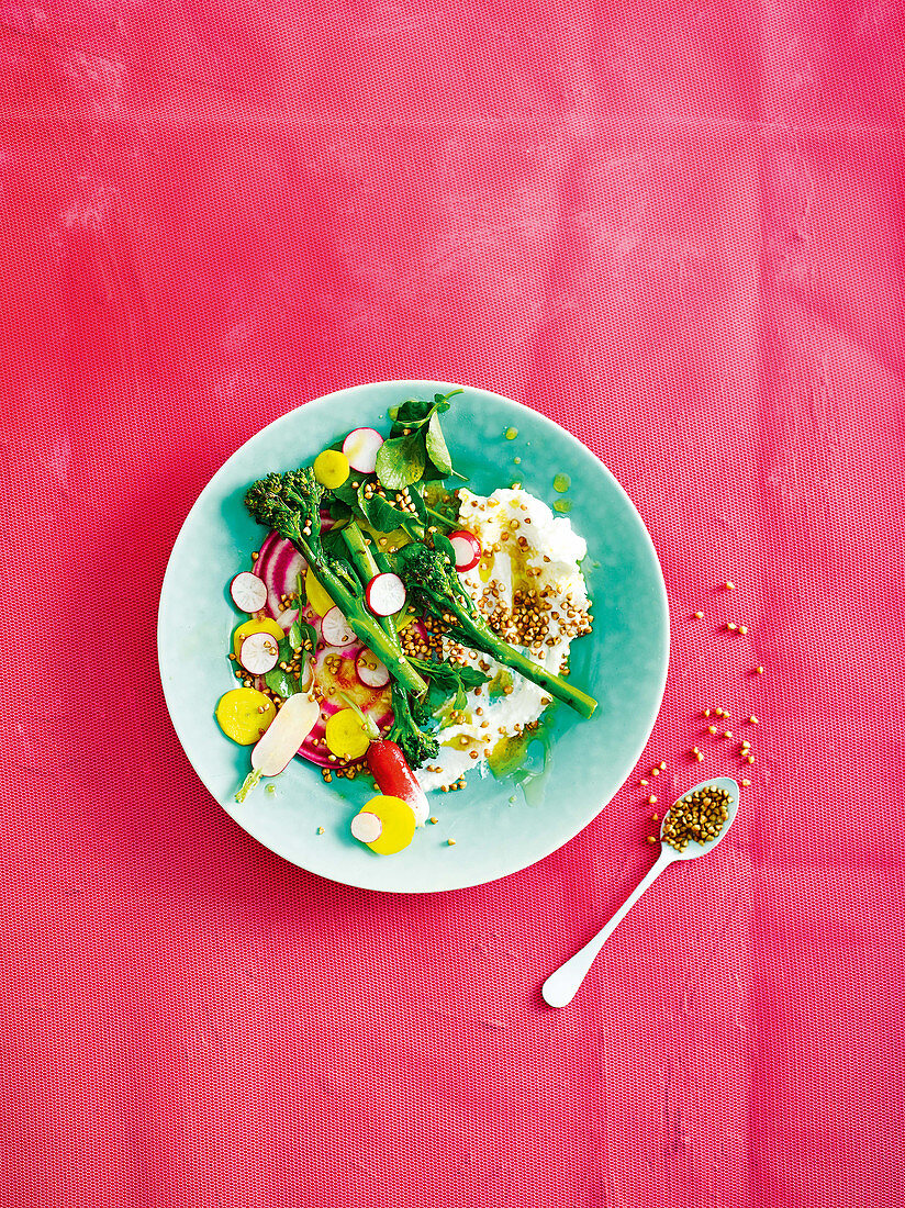 Goat’s curd and spring greens salad with popped buckwheat