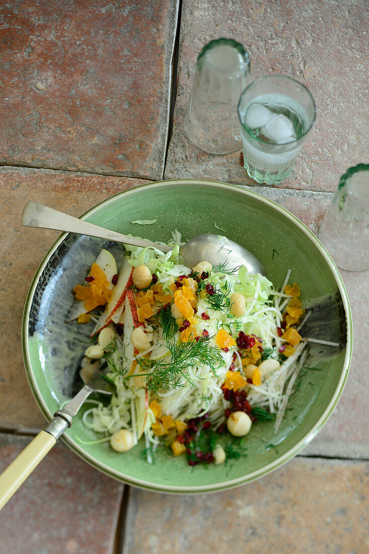 Turkish white cabbage and kohlrabi salad with pears, apricots and barberries